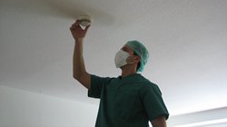 Foto: Installation mit Schutzkleidung, SAG GmbH